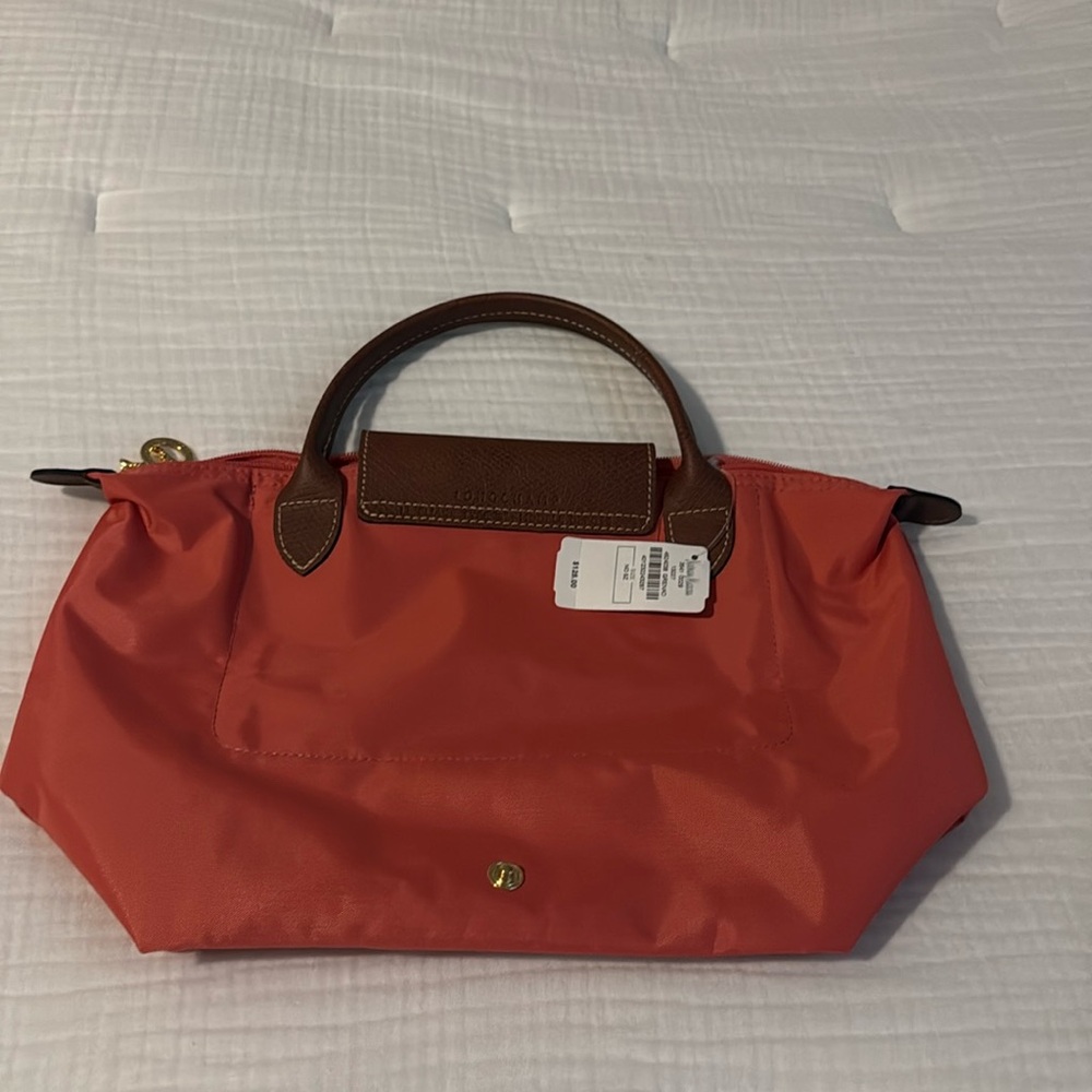 Long champ size small pink purse